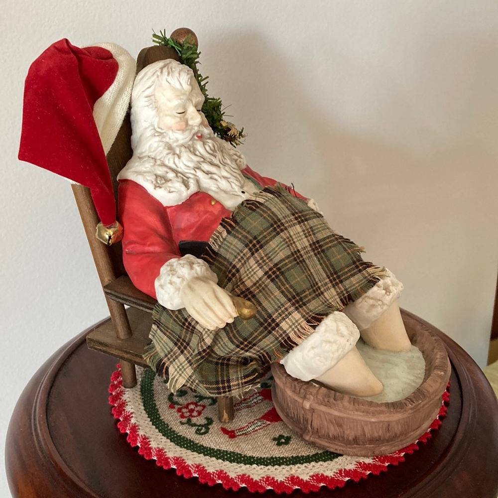 Vintage. Tired Santa soaking his feet in water